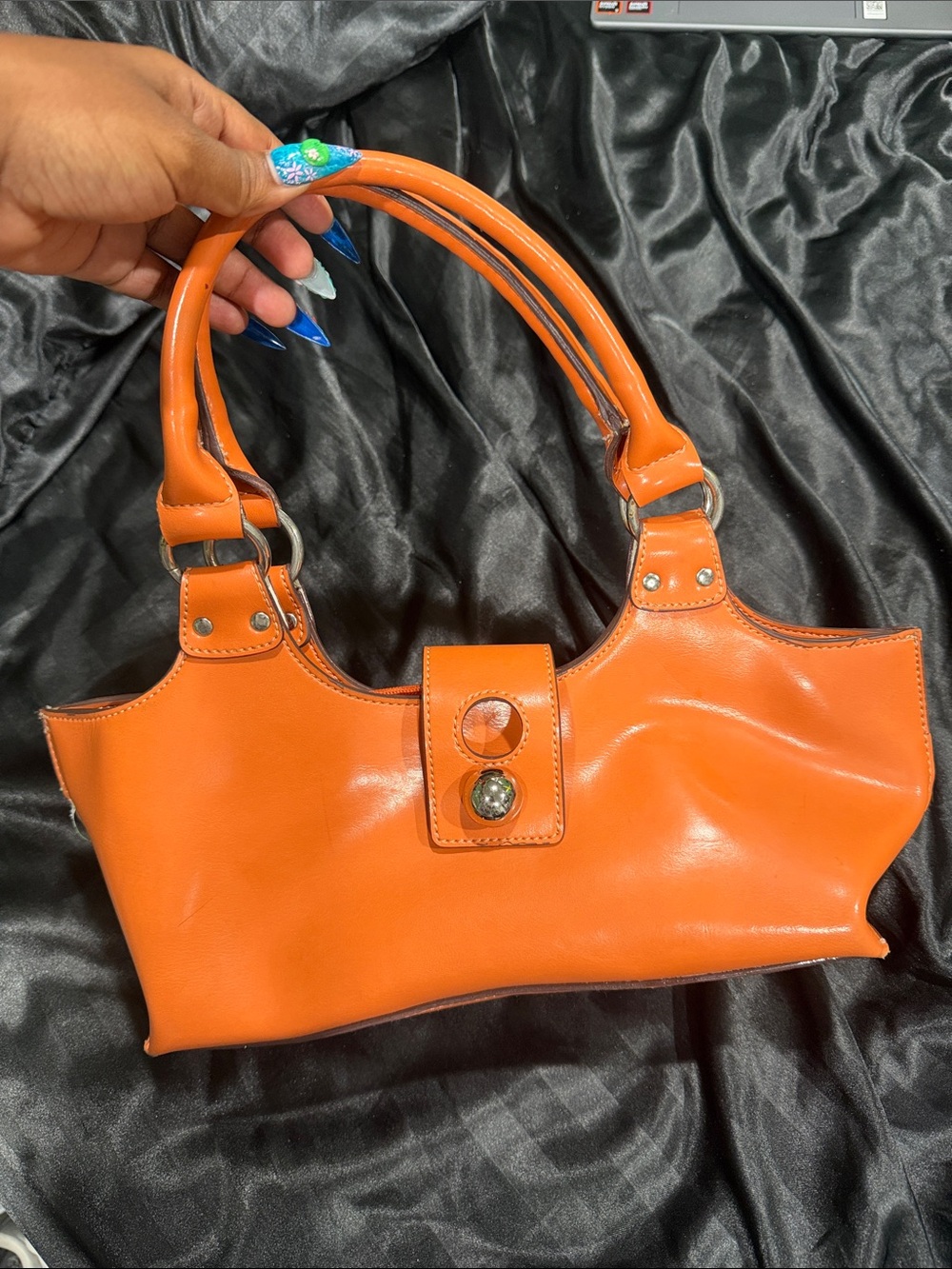 Structured Orange Shoulder Bag with Decorative Snap Tab